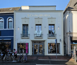 Umbau und Sanierung eines alten Kinos zu Gewerbeflächen und Wohnen